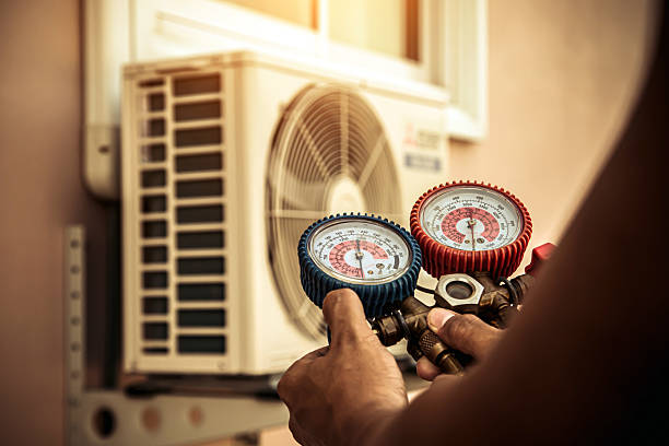 Professional Ac Installation technician working in Ridgeville, IN
